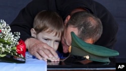 The nightmare: Parents mourn their children amid war in Ukraine