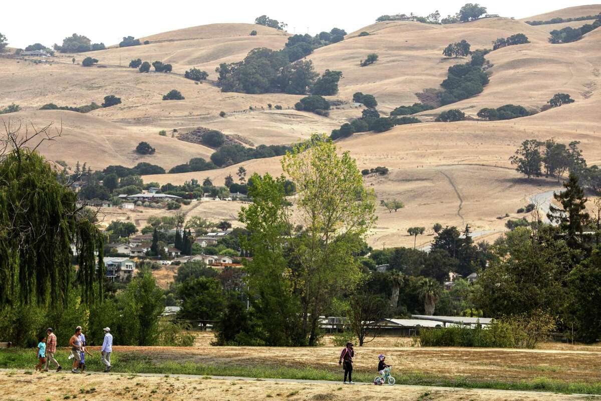 The hills of the Sierra Vista Open Space Preserve can be seen from part of the Bay Area Ridge Trail at Penitencia Creek Park in San Jose, Calif., Monday, July 26, 2021. The trail is 550 miles of proposed route which would bypass the nine-county area. It is approaching 400 miles of track completed after 30 years of work.