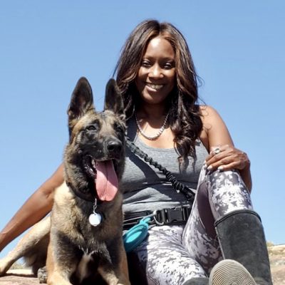 Phae Sunday poses with her dog during a hike, place and date not specified | Photo courtesy of Phae Sunday, St. George News