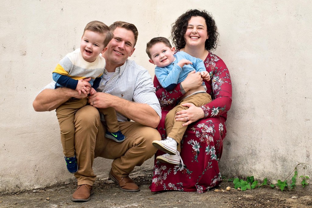 The couple are seen with their two young sons in a photo taken shortly before Nicolette came out as lesbian to Ryan.